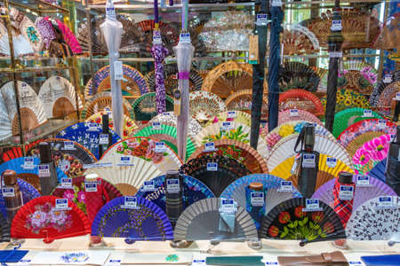 Seville, Spain - December 03,2021: shop window with hand painted fansのeditorial素材