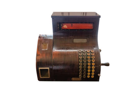 Old wooden cash register with round keypad and crank isolated on white backgroundの写真素材