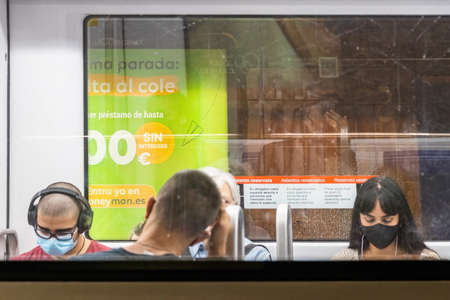 Barcelona, Spain - September 21, 2021: view of the interior of a subway car through one of its windowsのeditorial素材