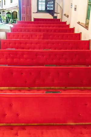 seats in red velvet lines