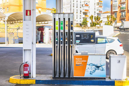 Huelva, Spain - March 10, 2022: View of a petrol pump at a gas Repsol stationのeditorial素材