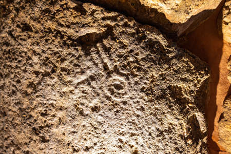 Artistic manifestation engraved in the stone in the megalithic monument of El dolmen de Sotoの写真素材