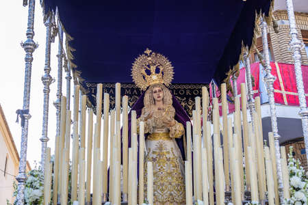 Holy Week Procession of the Paso (Platform or Throne) Our Lady of the Angels through the streets of the cityの写真素材