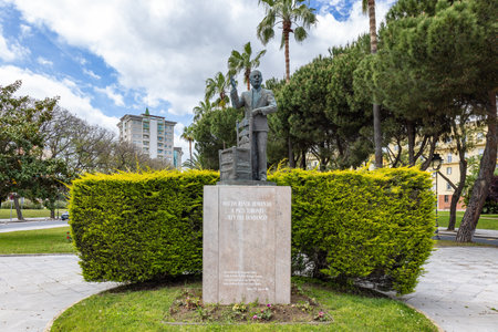 Huelva, Spain - April 24, 2022: Monument to Paco Toronjo on AndalucÃ­a avenue in Huelva, with the text Huelva pays homage to Paco Toronjo King of Fandangoの写真素材