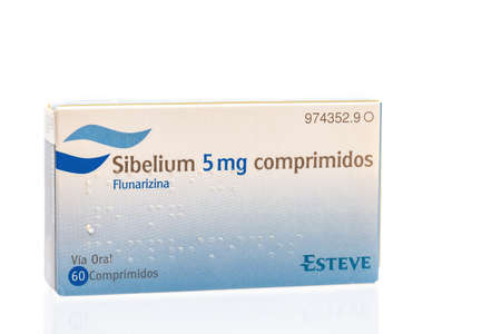 Huelva, Spain-June 4, 2022: Spanish box of Flunarizine, sold under the brand name Sibelium, is a medication used to treat migraines, occlusive peripheral vascular diseaseのeditorial素材