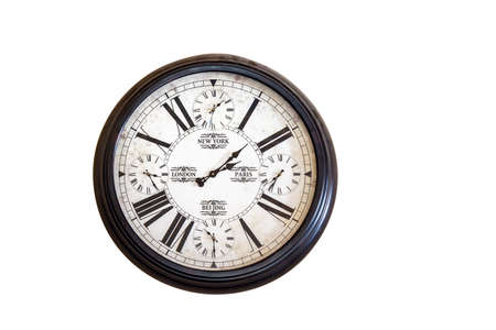 Antique wall clock with the local time and the time in New York, London, Paris and Beijing isolated on white background with space for textの写真素材