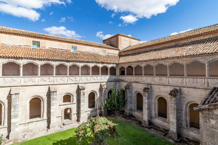 Avila, Spain - September 9, 2017: Cloister of Royal Monastery of Saint Thomas, Real Monasterio de Santo Tomas, is a monastery of the Catholic Monarchs of Spain in Gothic style in Avila, Spainのeditorial素材