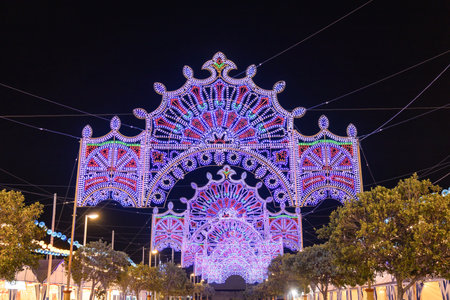 Lights decoration of The Columbian Festivals celebrations in the city of Huelva (Fiestas Colombinas de Huelva), to commemorate the first voyage of Christopher Columbusの写真素材