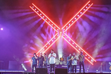 Huelva, Spain - May 25, 2022: The singer Manuel Carrasco in a concert in his home town, Isla Cristina, in Huelva, Andalucia, Spainのeditorial素材