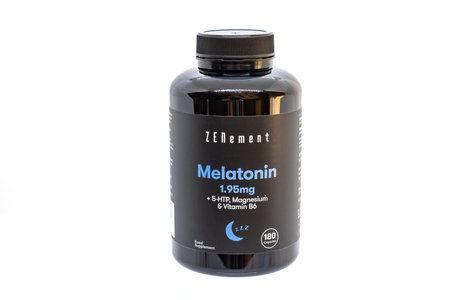 Huelva, Spain - August 30, 2022: Bottle of pills of Melatonin 1.95 mg and 5-HTP, Magnesium & Vitamin B6のeditorial素材