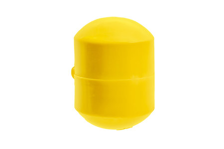 Yellow capsule kinder egg shape surprise isolated on white backgroundのeditorial素材
