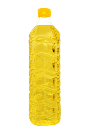 A plastic bottle of sunflower oil, an oil of vegetable origin that is extracted from the pressing of the seeds of the sunflower plant, isolated on white for mockupの写真素材