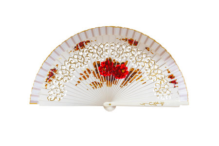 Spanish white open hand fan, decorated with floral motifs, isolated on white backgroundの写真素材