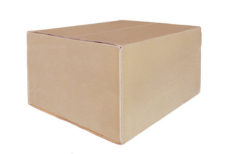 Closed cardboard box isolated on a white background.の写真素材