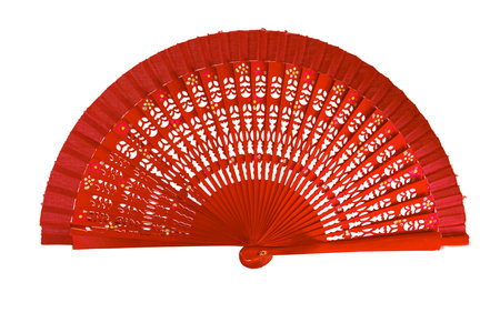 Spanish red open hand fan, decorated with floral motifs, isolated on white backgroundの写真素材