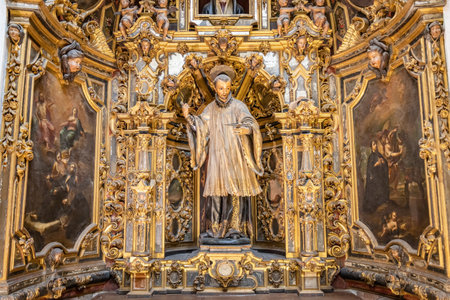 Seville, Spain - November 12, 2022: Altarpiece of Saint John Francis Regis inside the Church of San Luis de los Franceses of baroque architecture from the 18th century. Historic center of Sevilleのeditorial素材