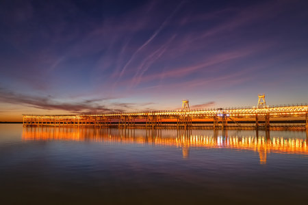 Mining pier known as the Tinto Dock Muelle del Tinto at night. This is one of the remains left by...