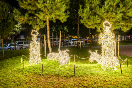 Christmas decoration on the Huelva promenade representing the Nativity of Jesus in Bethlehem. Religious scene of the sacred Family in Andalusia, Spainの写真素材