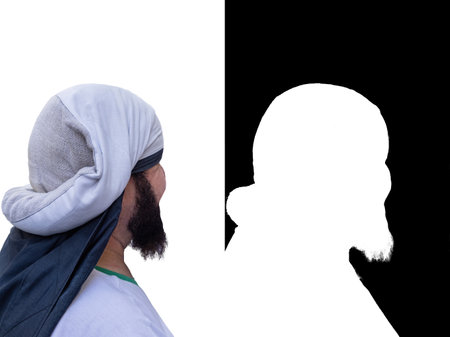 Rear view of a costalero bearers with the Costal (Sack) cloth placed on their head and neck to better carry the pasos (platform or Throne) of Holy week.Isolated on white with clipping mask and pathの写真素材