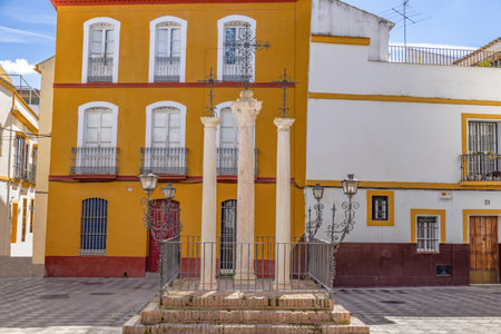 The Plaza de las Cruces gives its name to the neighborhood of Santa Cruz in Seville. It is a small square or rather a widening at the end of the street in the center of which three crosses are erectedの写真素材