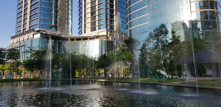 Fountain and Glass Buildingsの写真素材