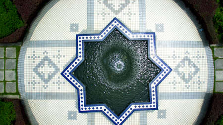 Aerial view of a fountain in a geometric settingの写真素材