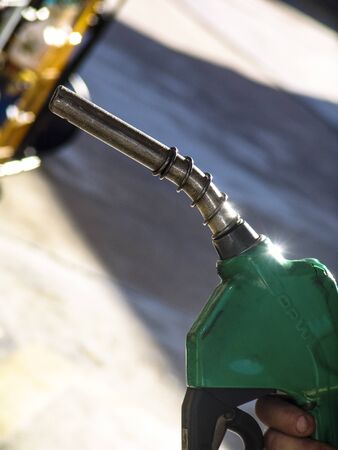 Sao Paulo, Brazil, August 15, 2007. Gas nozzle in man's handのeditorial素材
