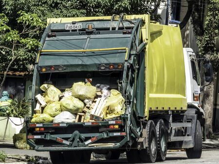 Sao Paulo, Brazil, December 20, 2018. Garbage truck on street of Sao Paulo city, Brazilのeditorial素材