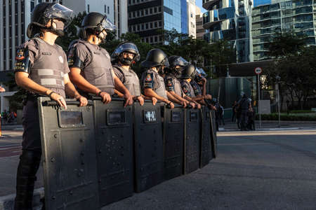 Sao Paulo, Brazil, June 07, 2020. Riot prepared to prevent the entry of demonstrators in favor of democracy and against the Bolsonaro government on Paulista Avenue in Sao Pauloのeditorial素材