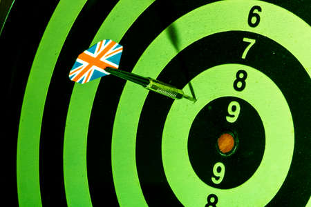 Dart with British flag board with darts in aim, with selective focusの写真素材