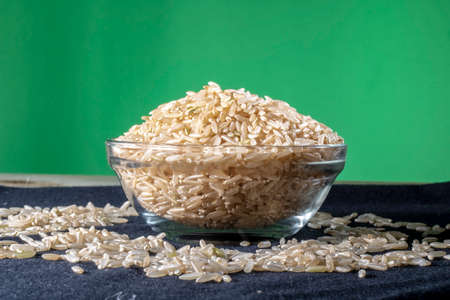 Integral rice on glass bowl isolated on black background in Brazilの写真素材