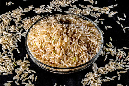 Integral rice on glass bowl isolated on black background in Brazilの写真素材