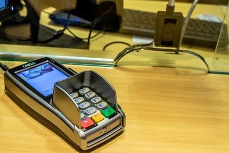 Sao Paulo, Brazil, May 19, 2018. Cielo credit card machine terminal on store with selective focus,...