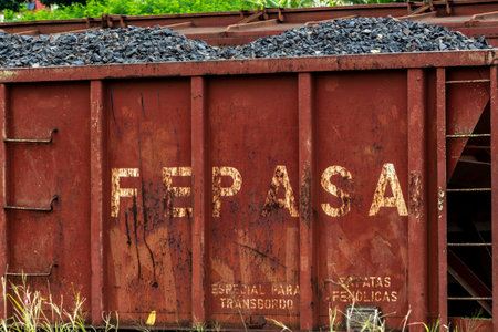 Matao, SÃ£o Paulo, Brazil, February 19, 2013. Railway wagons of the old railway company FEPASA loaded with stones in the maneuvering yard of the city of Mataoのeditorial素材