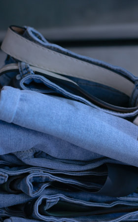 Jeans trousers stack closeupの写真素材
