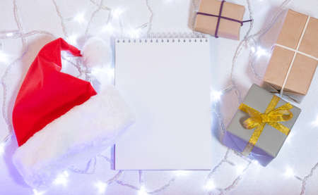 Christmas mockup card with red hat Top viewの写真素材
