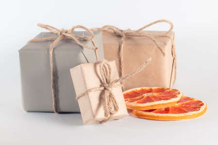 Gift boxes in brown craft paperの写真素材