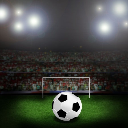 Soccer ball on the green fieldの写真素材