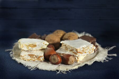   assorted sweets with nuts on dark backgroundの写真素材