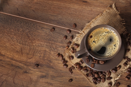 cup of coffee on wooden background の写真素材