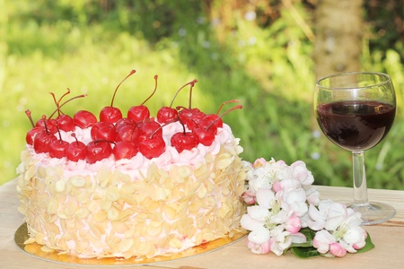 Birthday Cake Decorated with Cherries の写真素材