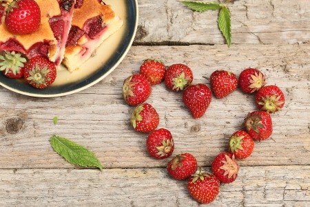 strawberries in the shape of heart の写真素材