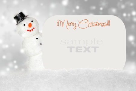 Snowman with winter snow background  Christmas cardの写真素材