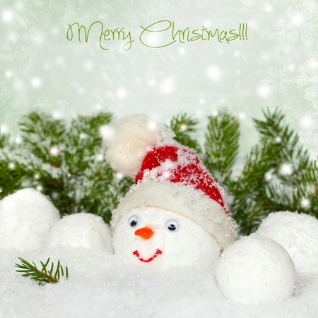 Snowman with winter snow background  Christmas cardの写真素材