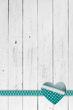 Heart on white wood backgroundの写真素材