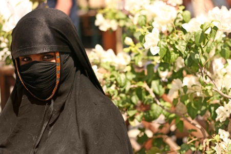HURGHADA, EGYPT - MAY 10  Portrait of young Arabian woman wearing a black head covering on May 10, 2008 in Hurghada, Egypt  Hurghada is a very popular health resort for tourist from Europe  のeditorial素材
