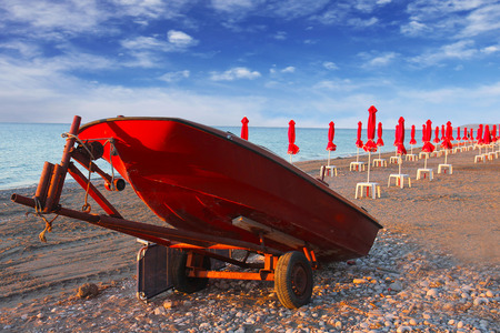 red umbrellas on the beach. Greece, Rhodesの写真素材
