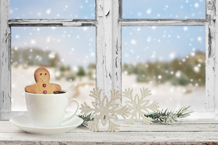 coffee cup on a snowy day window background