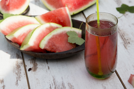 slice Watermelon on the table in gardenの写真素材