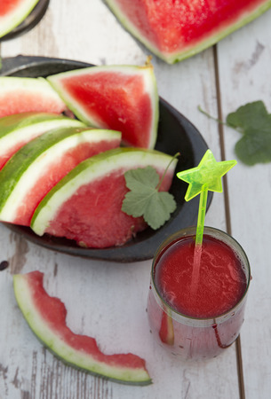 slice Watermelon on the table in gardenの写真素材